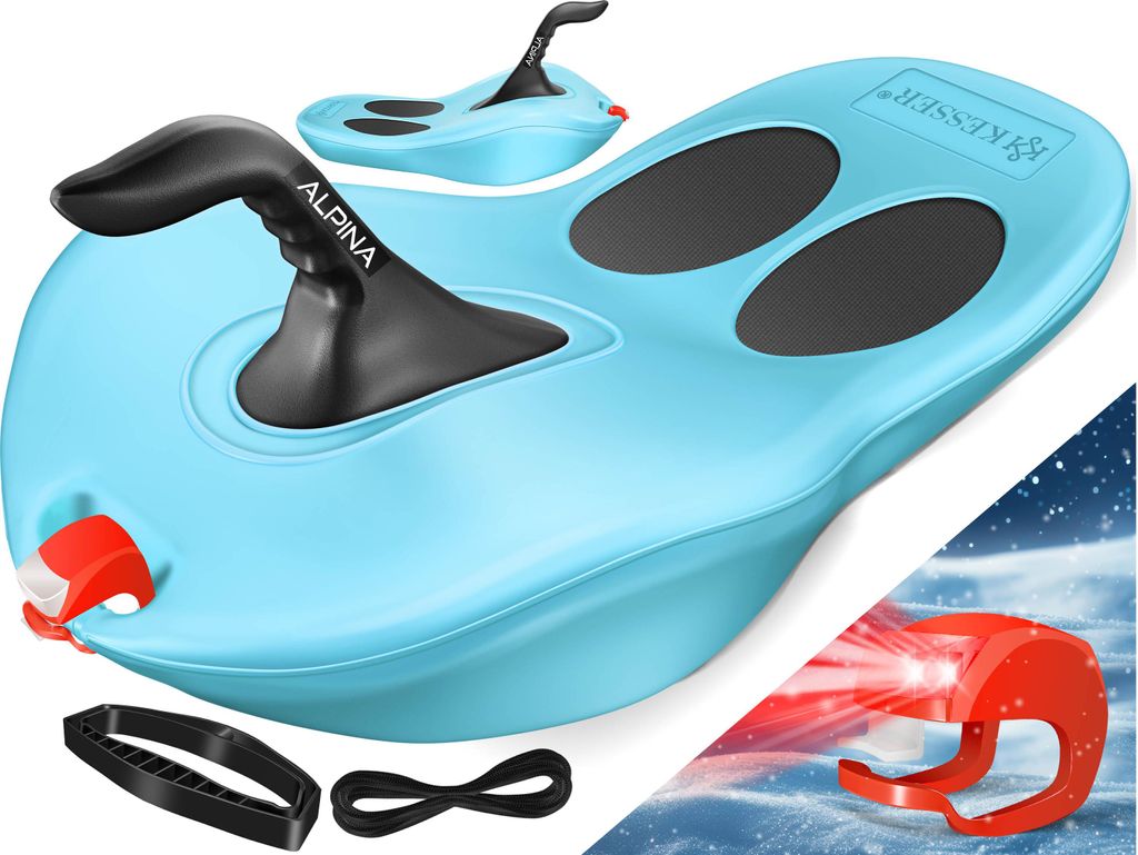 A light blue sled with black handles and black grip pads, shown from a diagonal angle. There are also smaller accessories and a red light accessory shown separately.