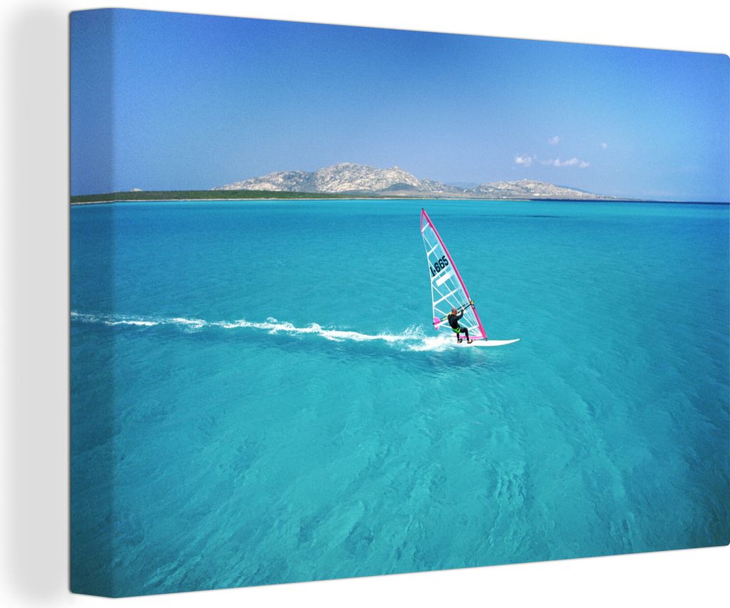 OneMillionCanvasses - Leinwandbilder - 140x90 cm, Ein Windsurfer surft im klaren Wasser, Wandbilder Kunstdruck Wanddekoration - Foto auf Leinwand...
