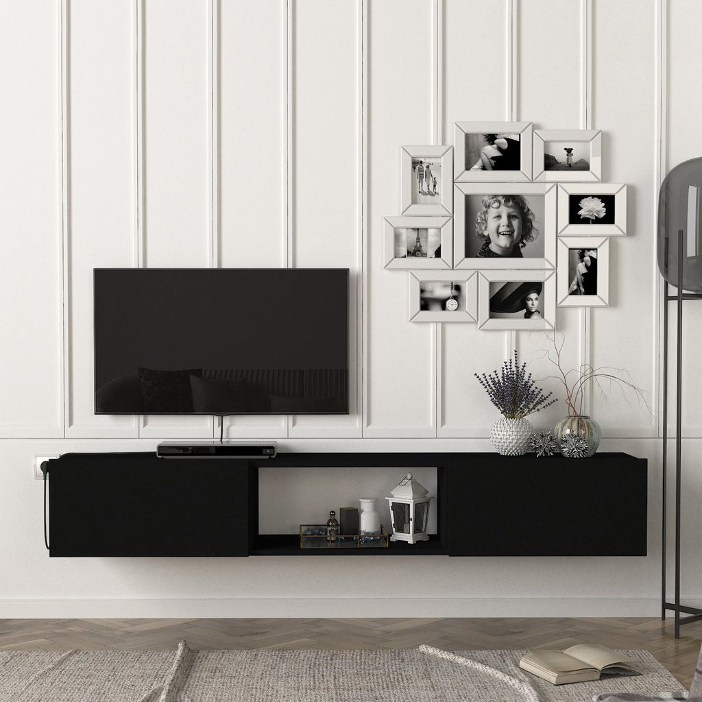 A modern living room setup with a wall-mounted TV and entertainment unit.