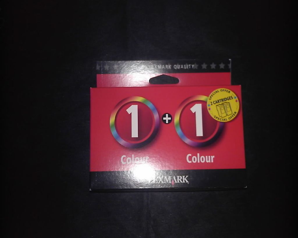 A product package for Lexmark ink cartridges against a black background.