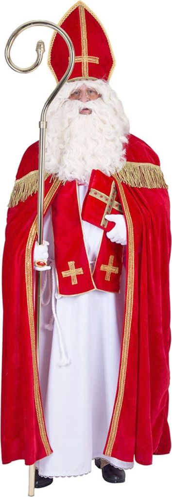 A man dressed as Saint Nicholas holding a staff.