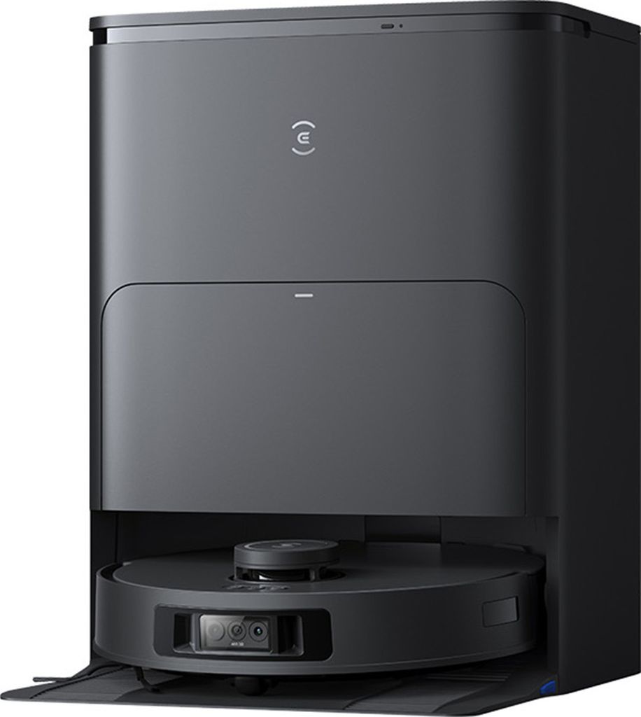 A black robot vacuum cleaner with its charging and docking station.