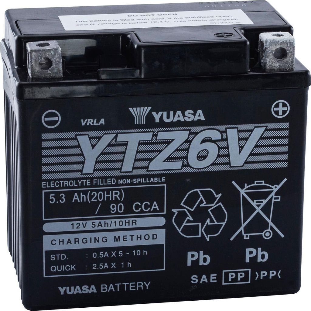 A black motorcycle battery with white text and logos.