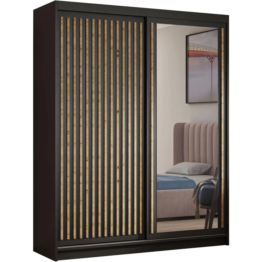 A wardrobe with sliding doors, one of which is mirrored, reflecting a bedroom scene.