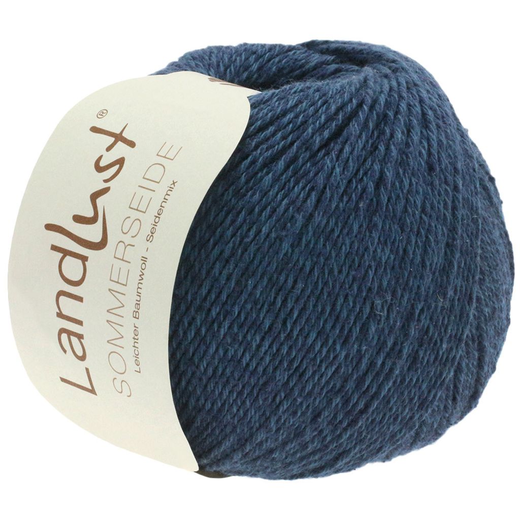 A ball of blue yarn with a label.