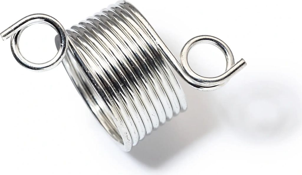 A close-up studio shot of a silver knitting thimble.