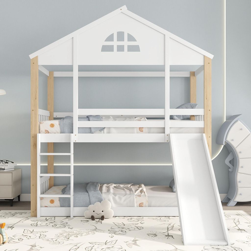 A white and wood bunk bed with a slide and ladder in a child's bedroom.