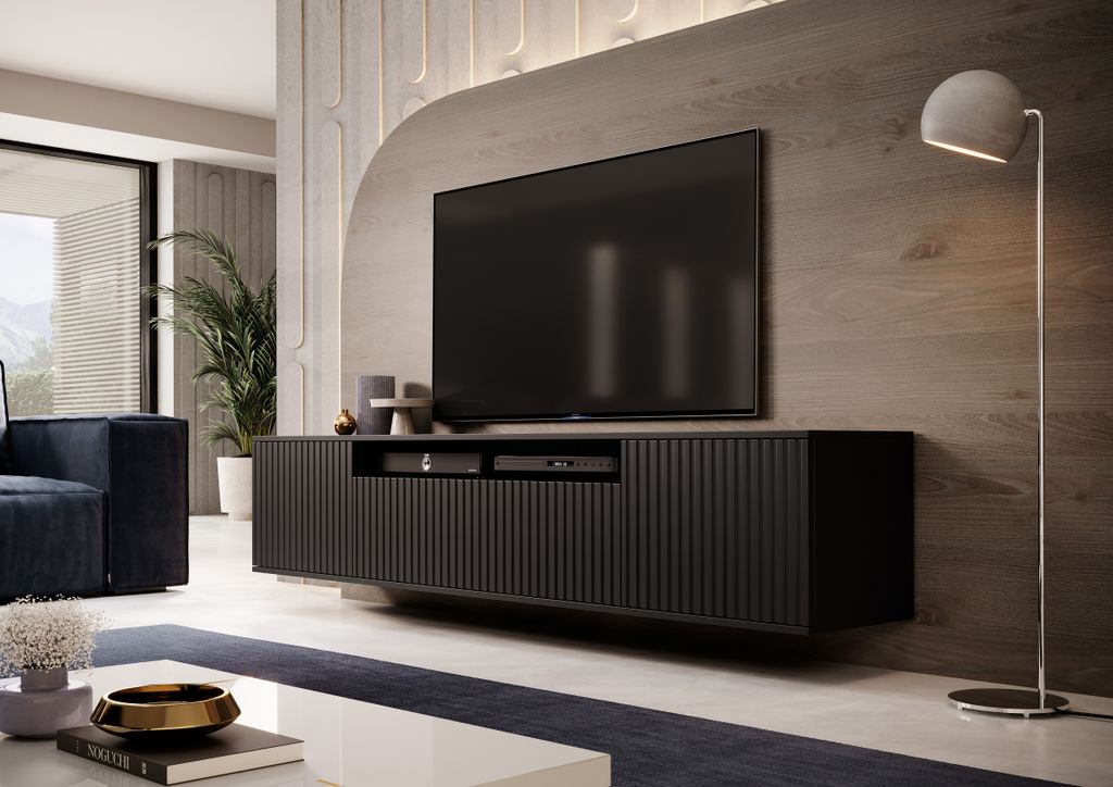 A modern living room with a wall-mounted TV cabinet.