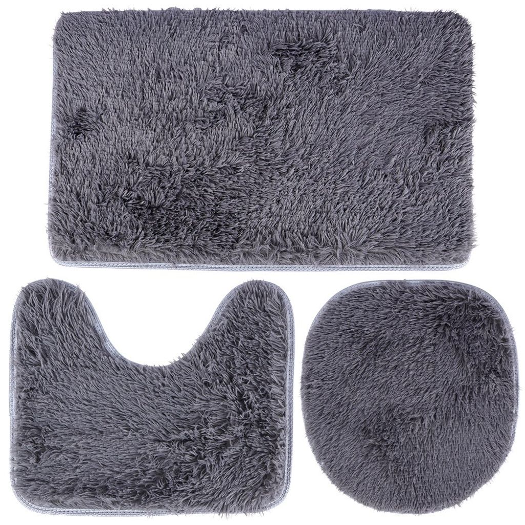 Three different bathroom mats are arranged on a white background.