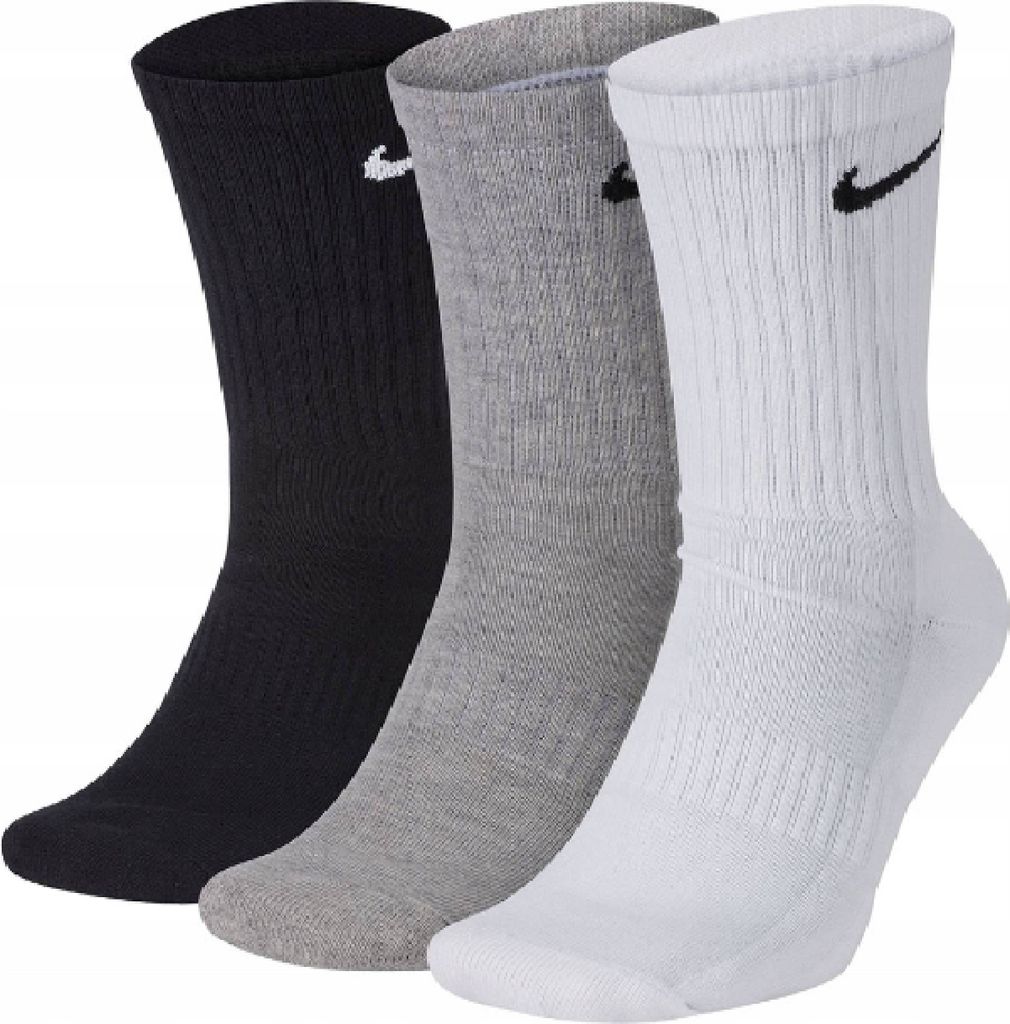 Three pairs of Nike crew socks in black, gray, and white.