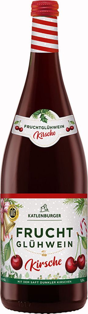 A bottle of cherry mulled wine with festive Christmas decorations.