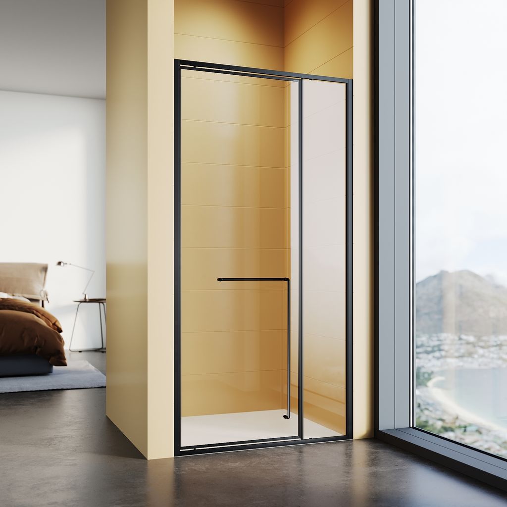 A modern shower enclosure with a black frame and glass doors, set in a bathroom with tiled walls and a view of a coastal landscape through a large window.