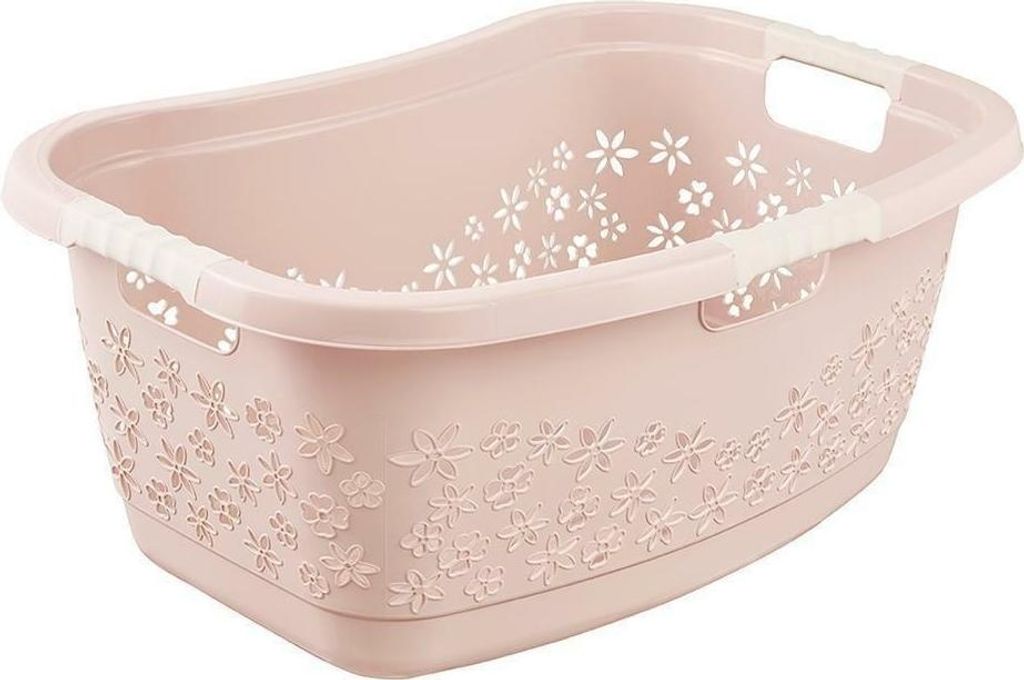 A pink laundry basket with a floral design.