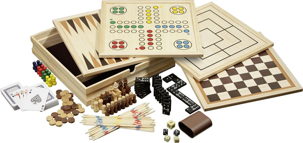 A collection of wooden board games and accessories laid out on a white background.