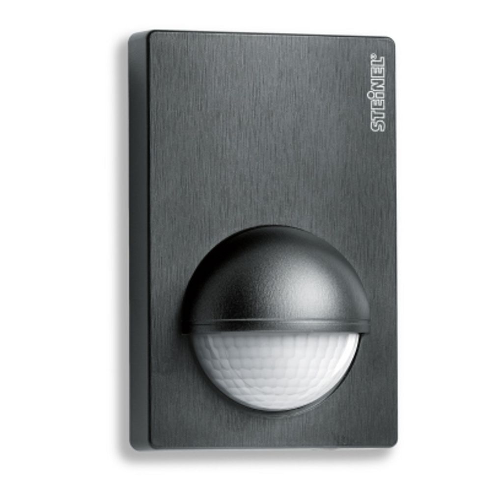 A close-up studio shot of a black motion sensor.