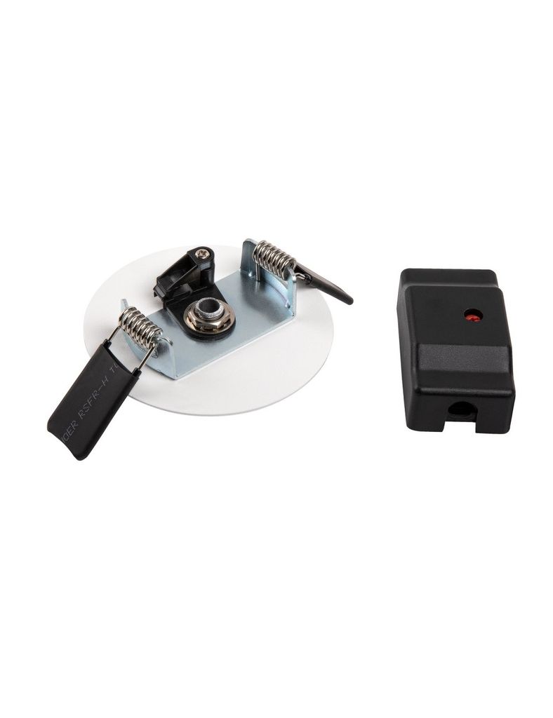 A white circular mounting plate with metal and black plastic components, and a separate black rectangular electronic component, are displayed against a white background.