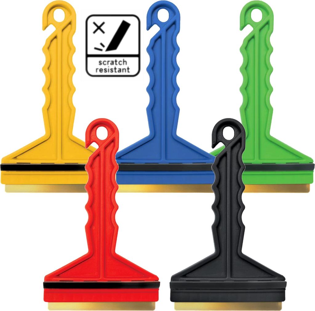 A collection of five ice scrapers in different colors arranged in a semi-circle.