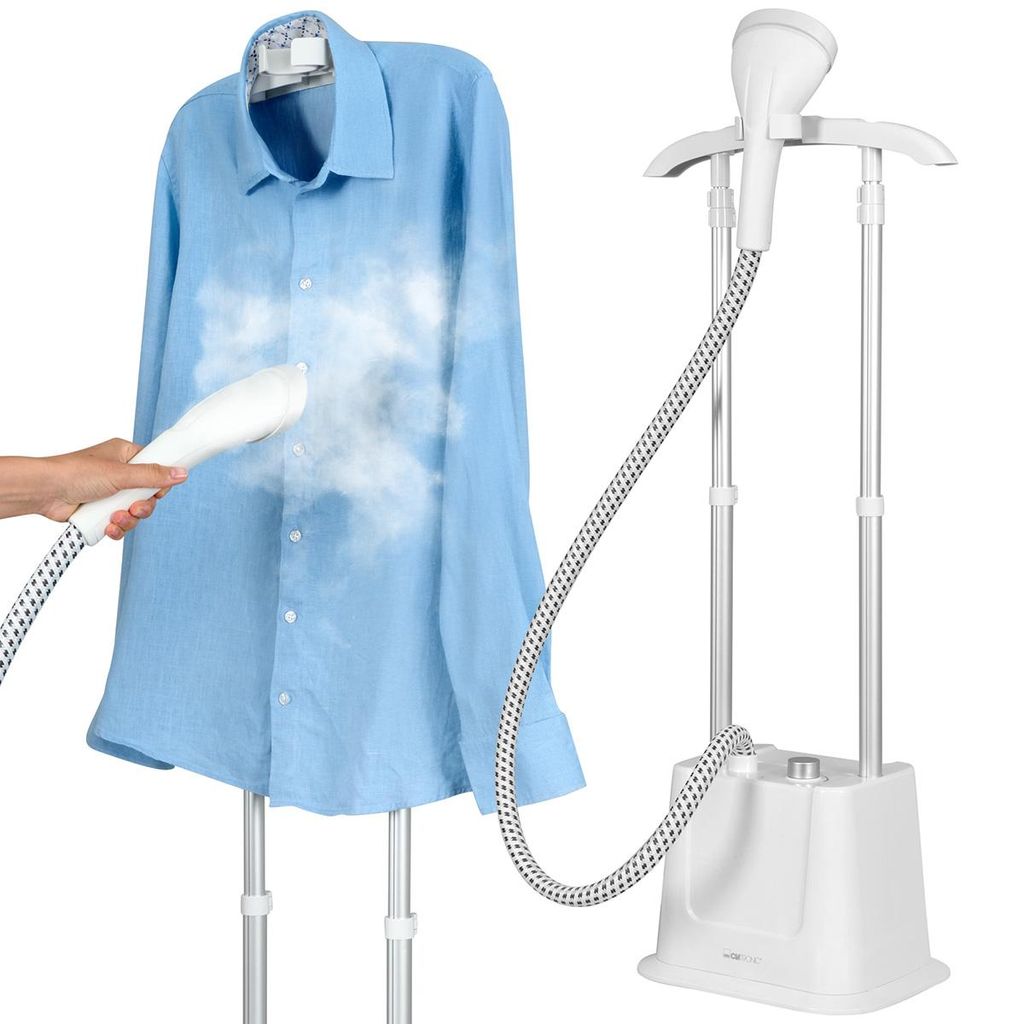 A blue shirt is being steamed by a garment steamer.