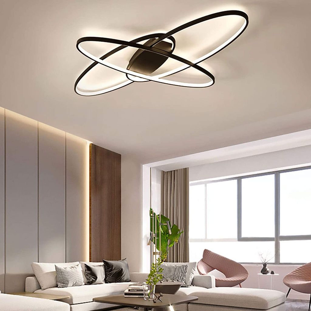 A modern living room with a stylish ceiling light.