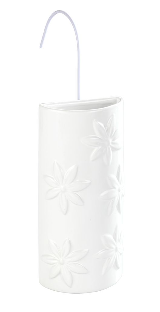 A white ceramic vase with embossed floral patterns and a white hook for hanging.