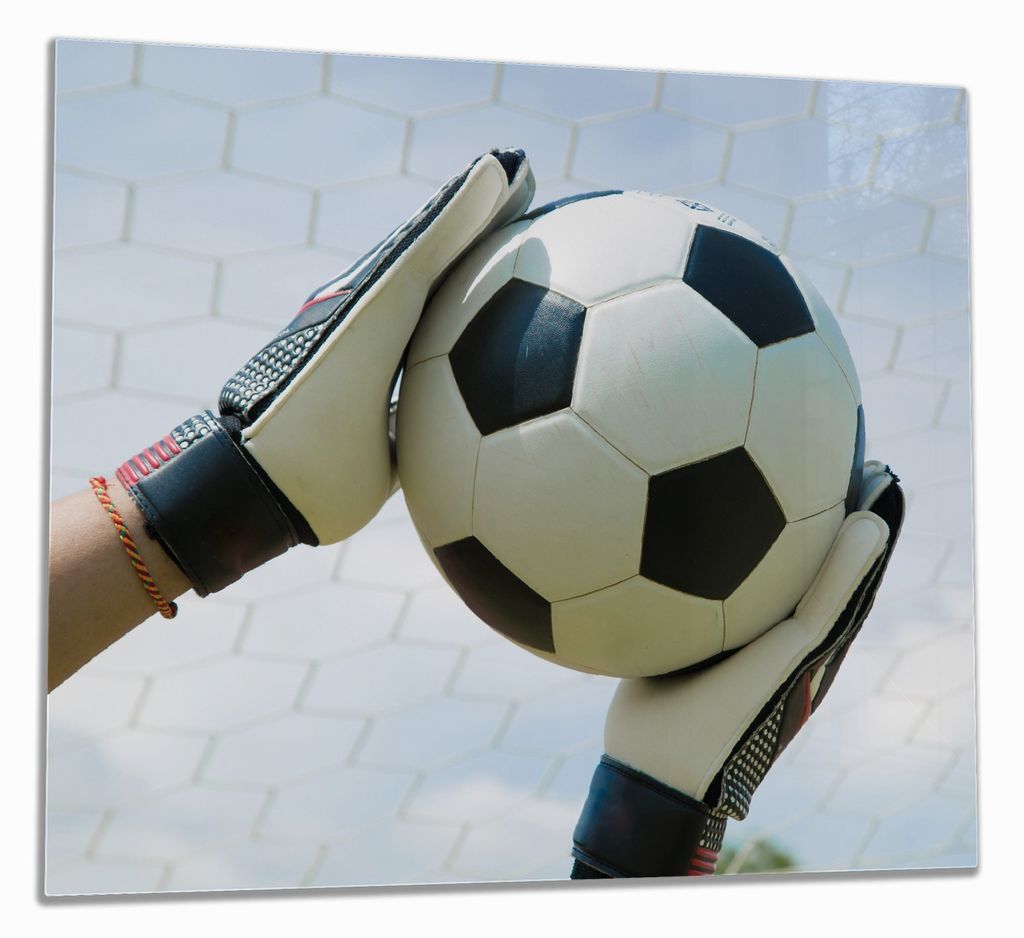 Wallario Herdabdeckplatte aus Glas, Größe 60 x 52 cm 1-teilig, Motiv Fußball - Torwart im Tor vor blauem Himmel
