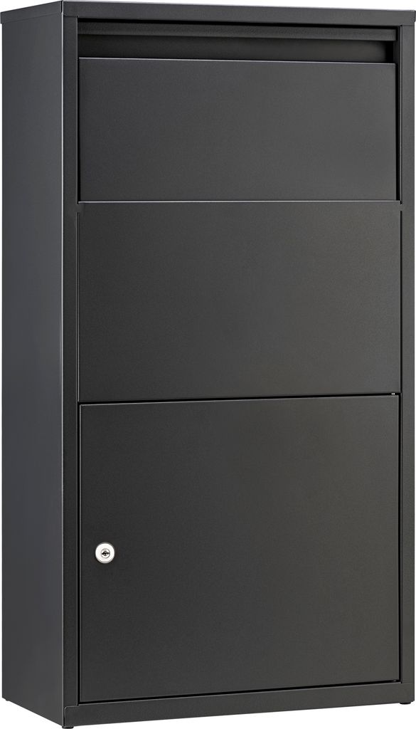 A dark gray parcel mailbox with a slot at the top and a door at the bottom with a keyhole.