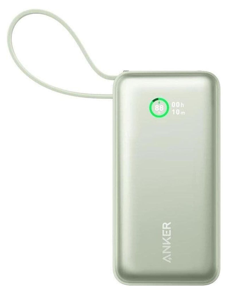 A light green Anker Nano power bank with a built-in USB-C cable and a digital display showing battery status.