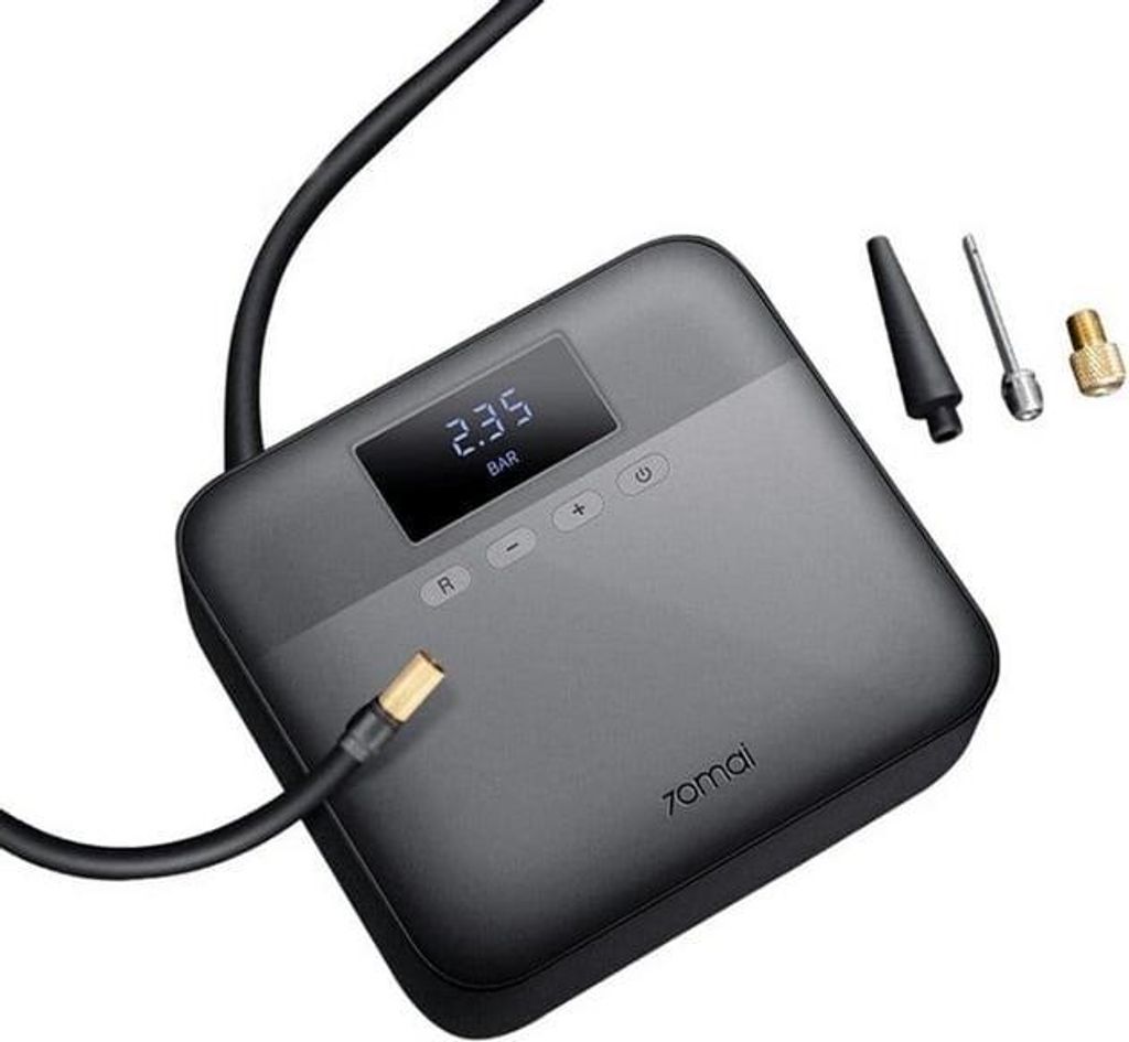 A portable air compressor with its accessories on a white background.