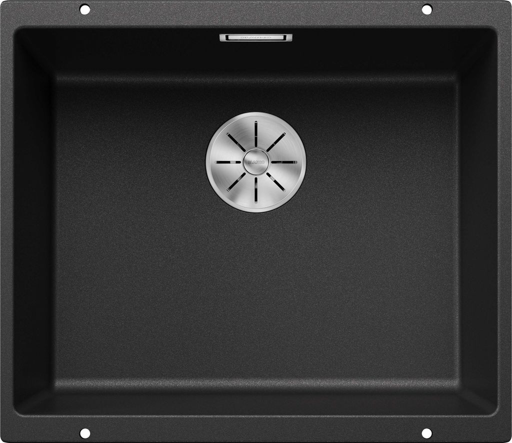 A top-down view of a black kitchen sink with a silver drain.