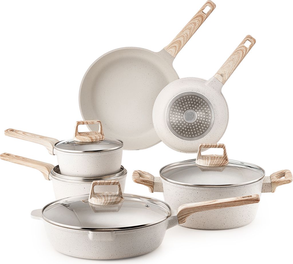A collection of white cookware with wooden handles is arranged on a white background.