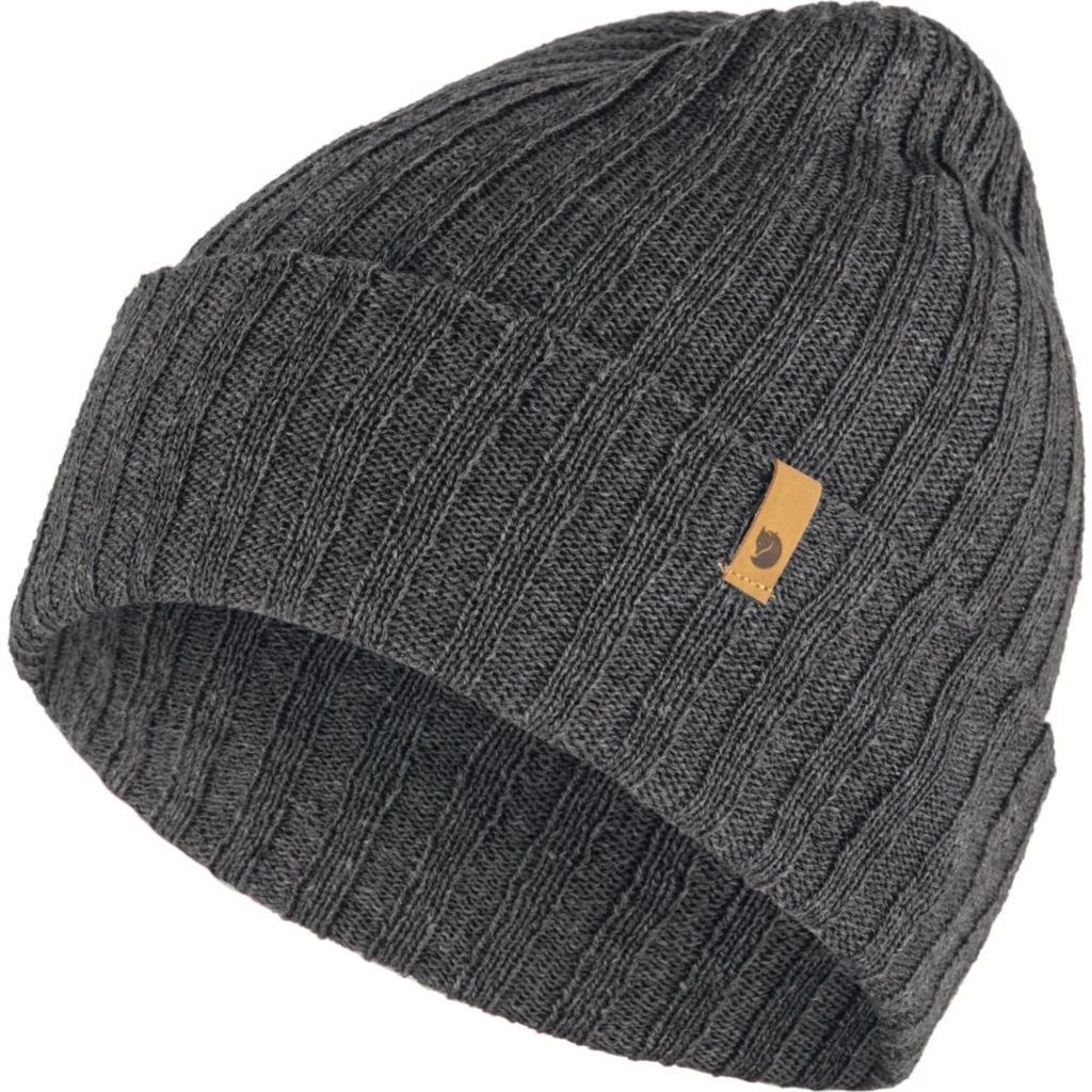 A close-up studio shot of a dark gray knitted beanie.