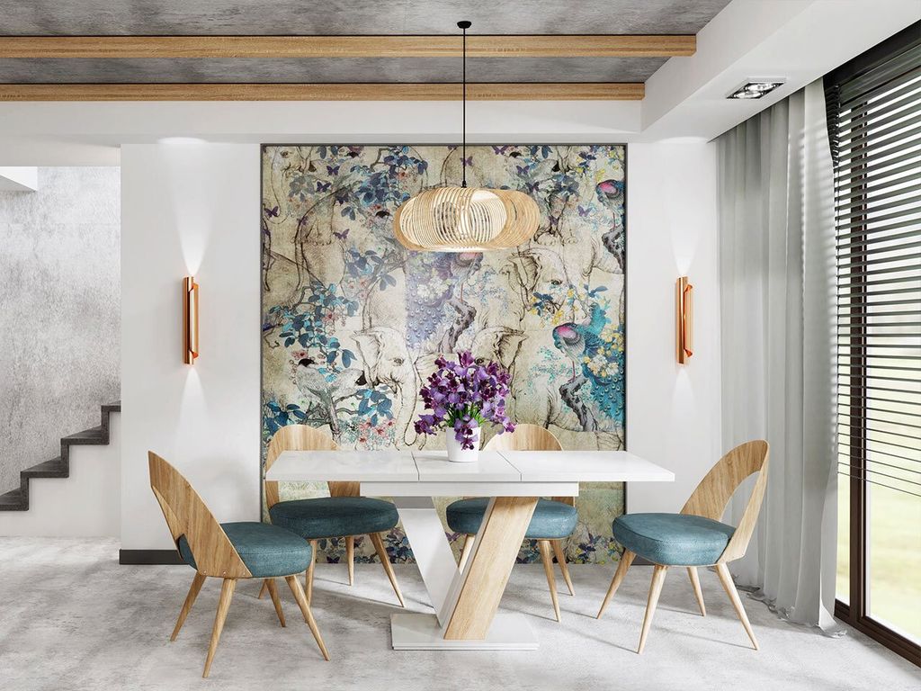 A dining room with a table and chairs, decorated with a large floral mural.