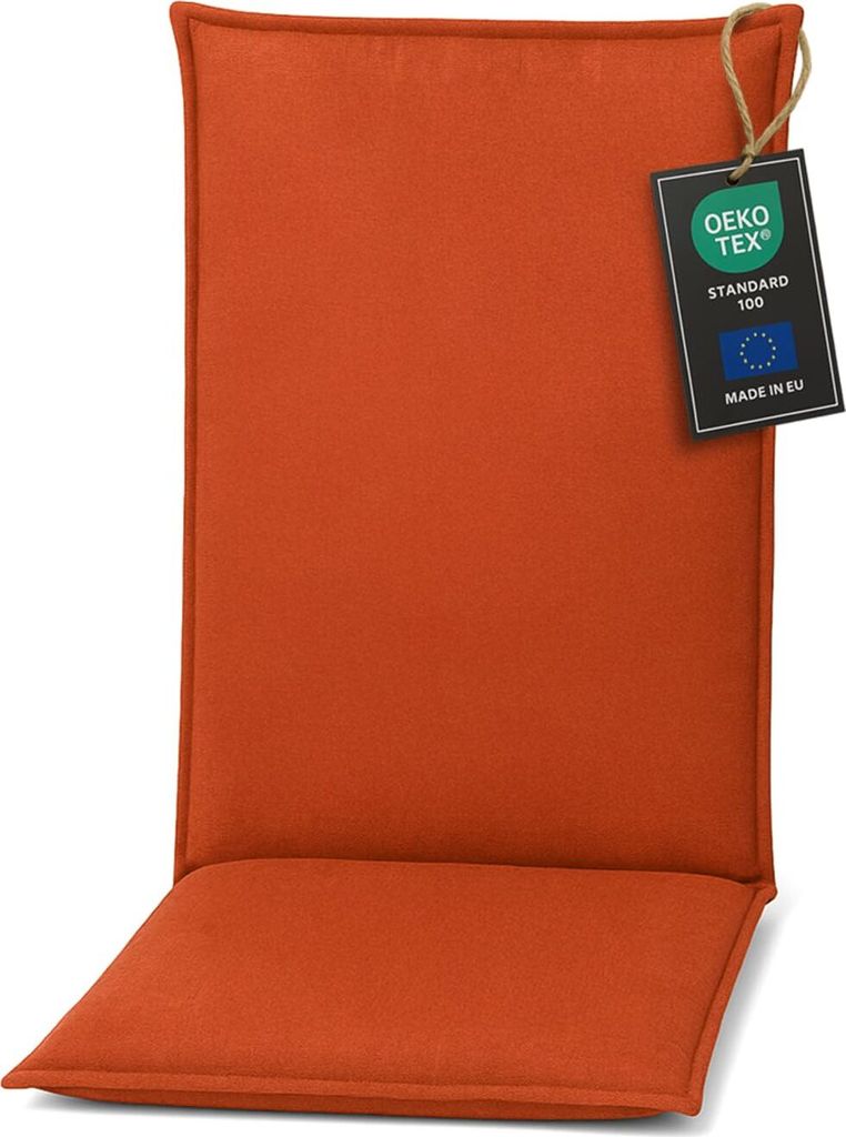 An orange chair cushion with a tag attached.
