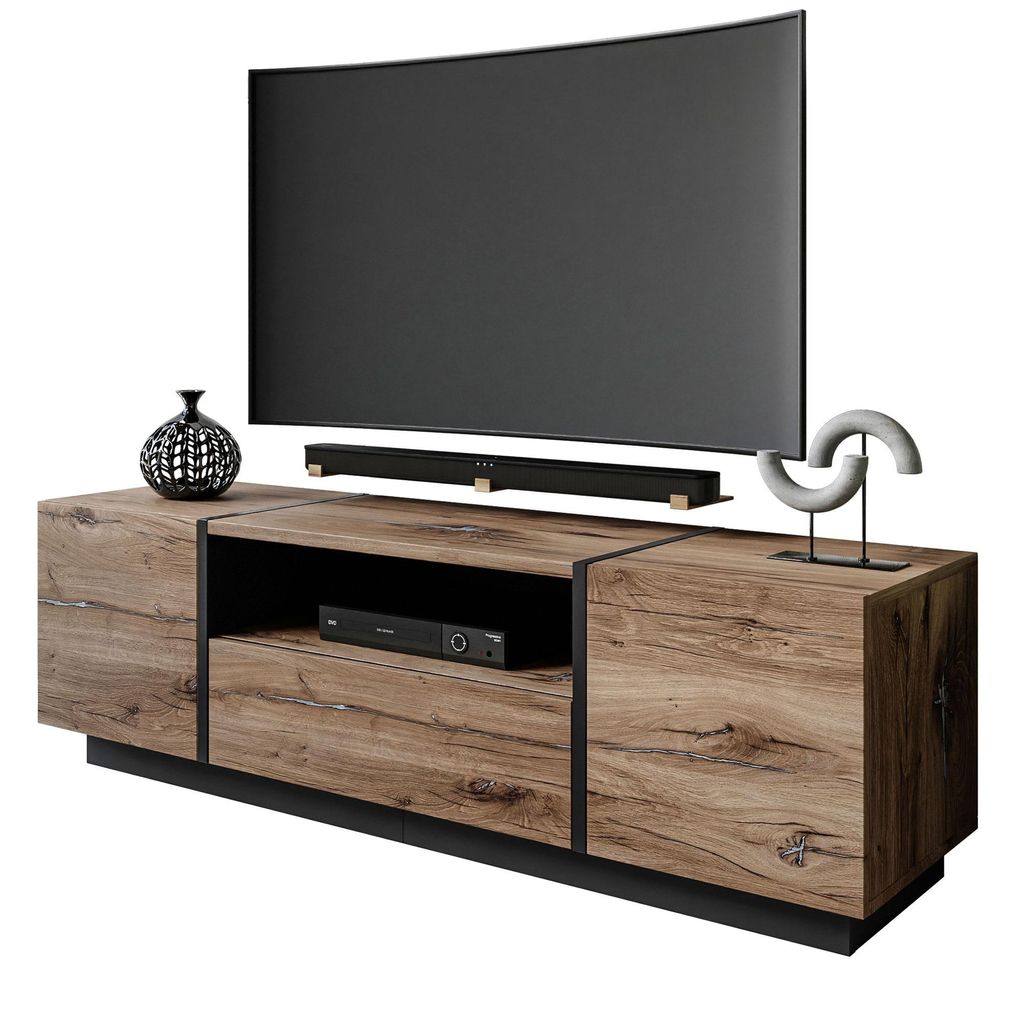 A TV stand with a TV on it, and decorative items.