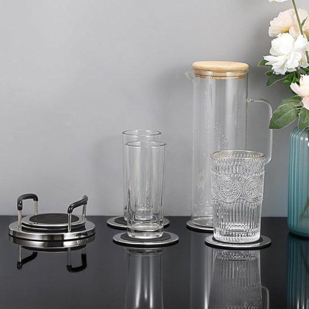 Runderonde onderzettersset aus Edelstahl in Silber-Black Metallic, ideal für Restaurants, Küchen, Bars und Tischdekoration.