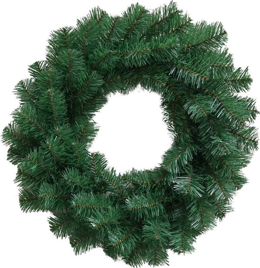 A green artificial Christmas wreath on a white background.