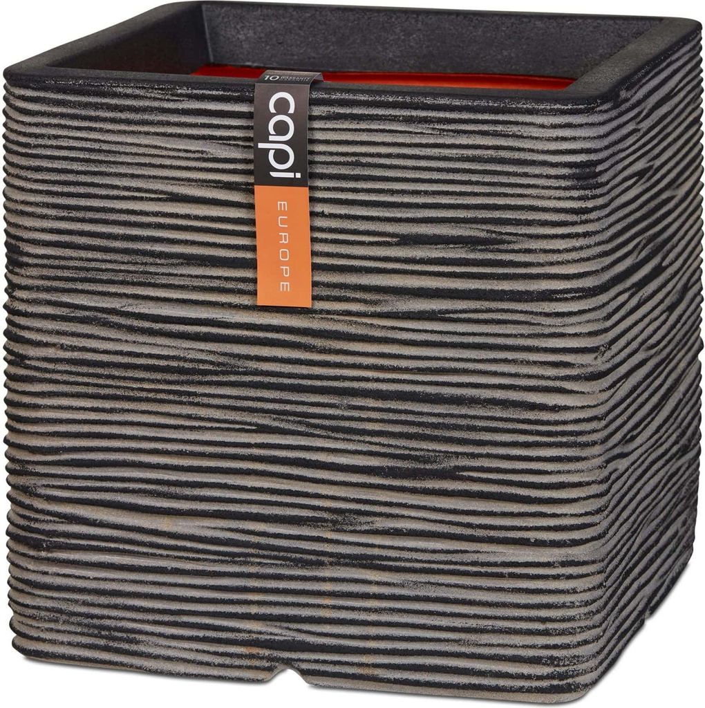 A square planter with a textured ribbed surface and a brand tag attached.