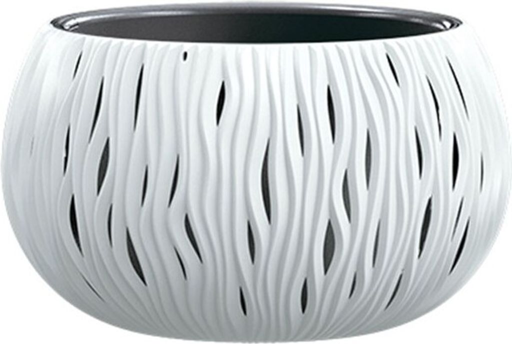 A white, decorative planter with a wavy, cut-out design.