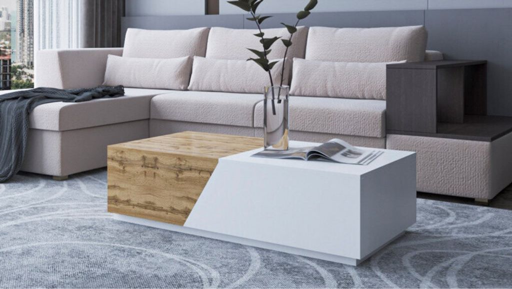 A modern living room scene featuring a sectional sofa and a contemporary coffee table.