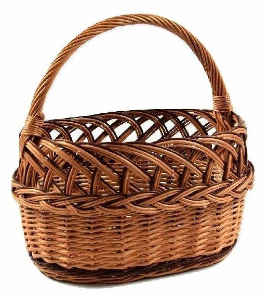 A woven basket with a handle on a white background.