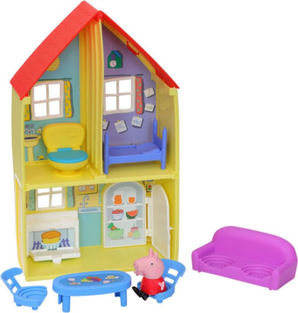 A toy dollhouse with furniture and a Peppa Pig figure.