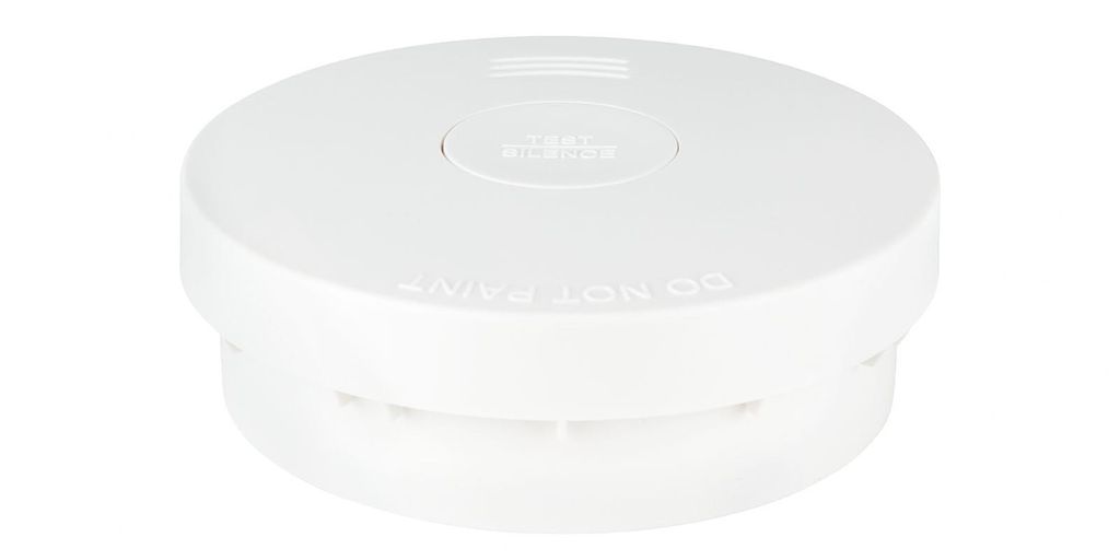 A white smoke detector is shown against a white background.