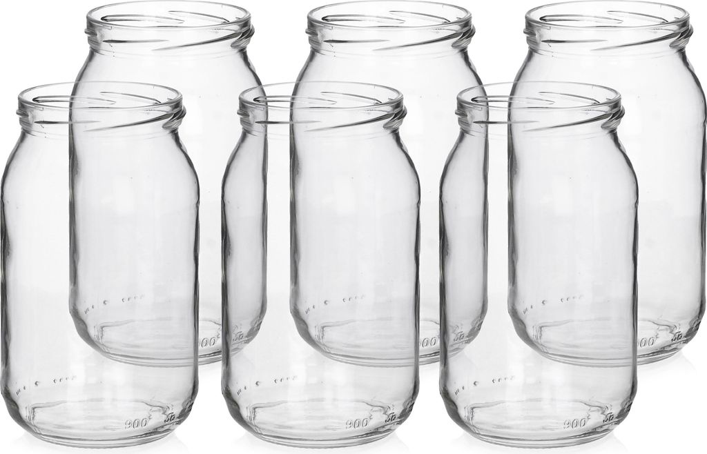 A group of empty glass jars arranged on a white background.
