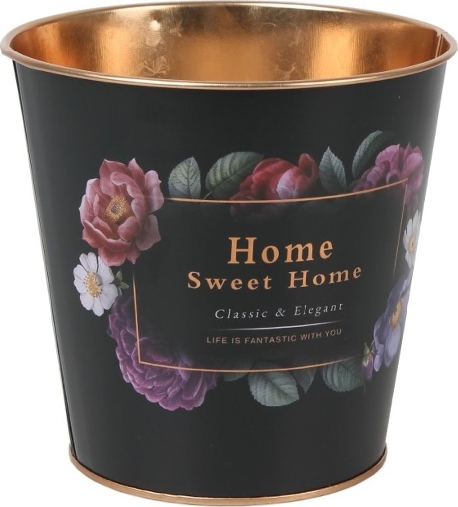 A black metal planter with a floral design and gold trim.