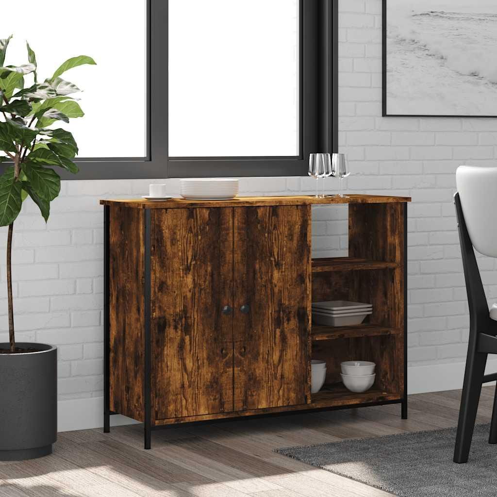 A wooden sideboard with two doors and open shelving is placed in a room with a window and a brick wall.