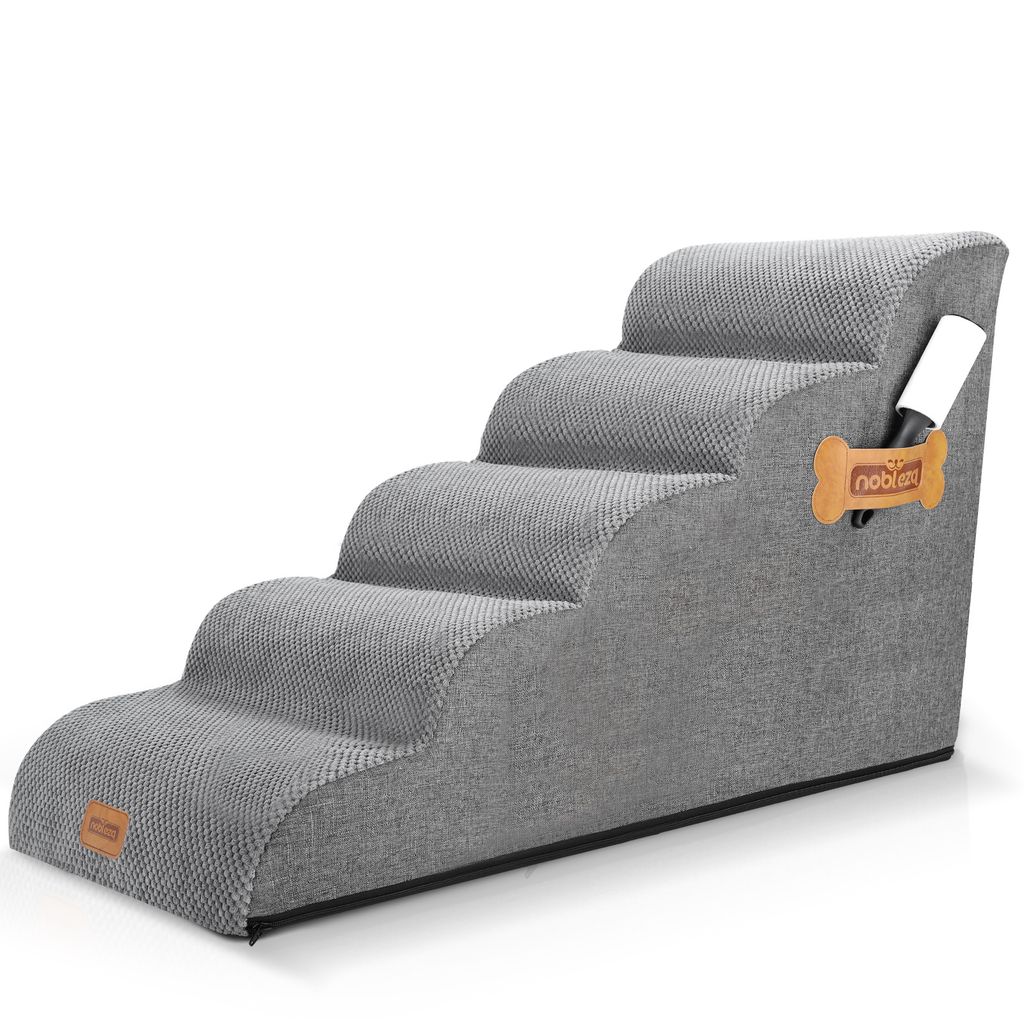 A grey pet stair with five steps against a white background.