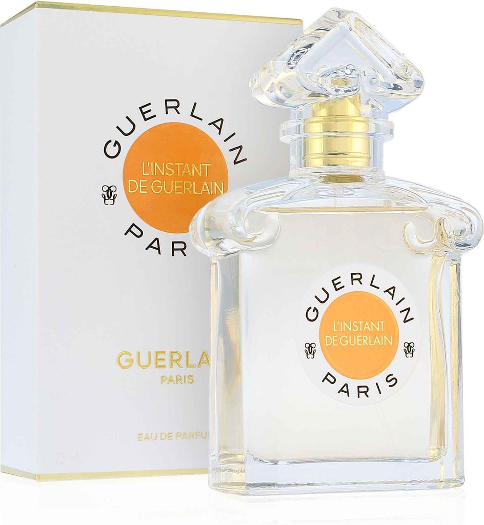 A bottle of Guerlain L'Instant de Guerlain perfume and its packaging are shown against a white background.