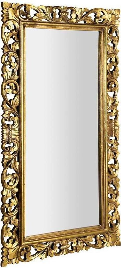 A rectangular mirror with an ornate gold frame.