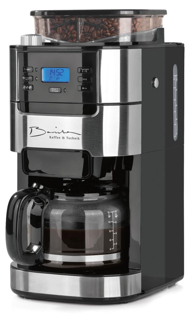 A close-up studio shot of a black and silver coffee maker with a glass carafe filled with coffee.
