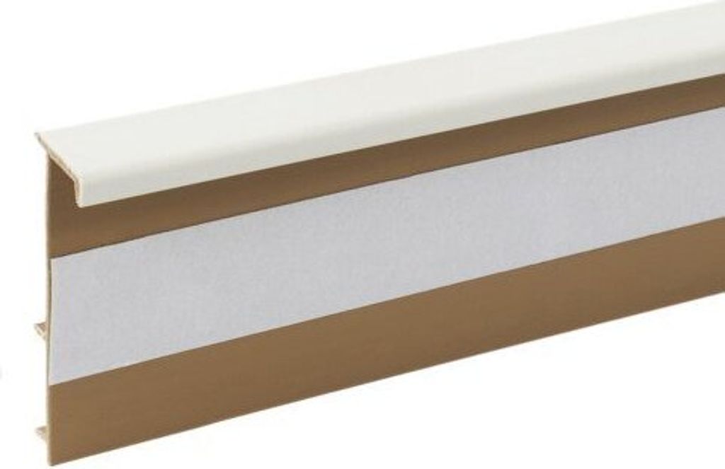 A close-up, straight-on shot of a carpet trim strip.